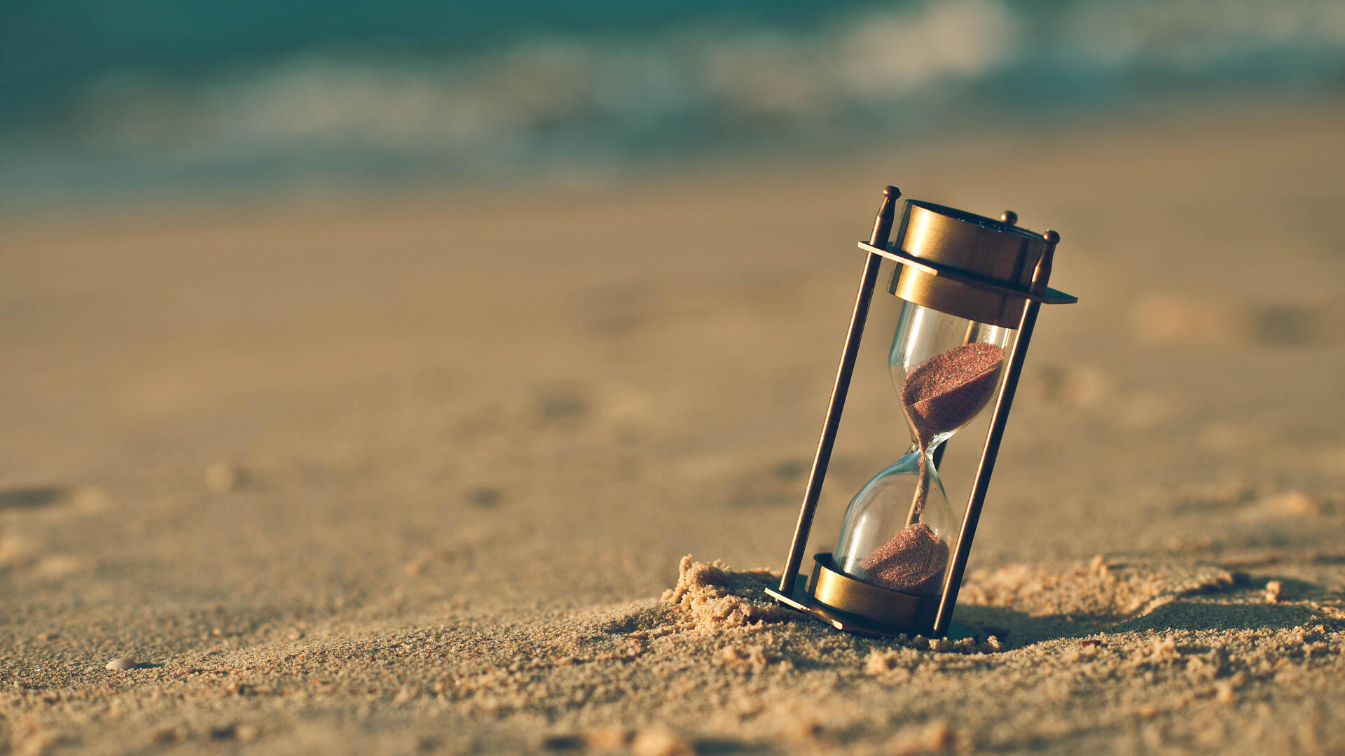 Timeglass på sandstrand